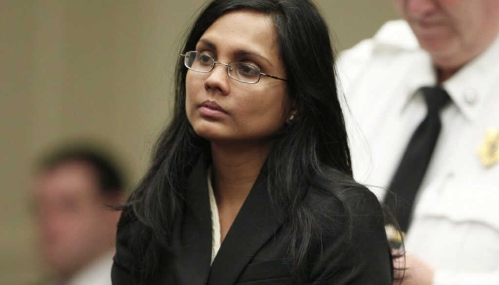 Annie Dookhan listens to the judge during her arraignment at Brockton Superior Court in Brockton, Massachusetts